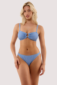Model wears a annabelle cornflower blue scrunch high leg bikini brief with a matching bikini top.