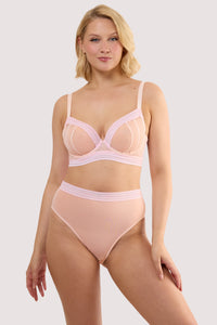Model wears a icon blush pink microfiber moulded cup bra with light pink moulded microfibre and underwired, full cups with a matching high waist thong.