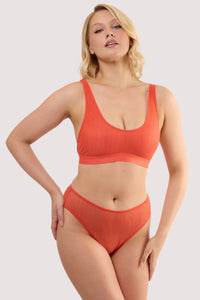 Model wears a veronica red microstripe crop bra with red microstripe mesh featuring soft crop-bra silhouette with matching high waist high leg brief