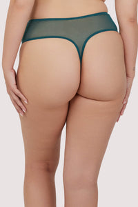 Model shows back of teal contrast embroidery balconette bra featuring thick adjustable straps and hook and eye fastening on supportive back band