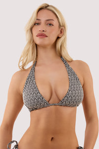 Model wears a misqua black and white textured chevron fuller bust bikini top with classic triangle shape featuring textured feel.