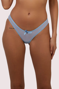 model wears sheer blue briefs