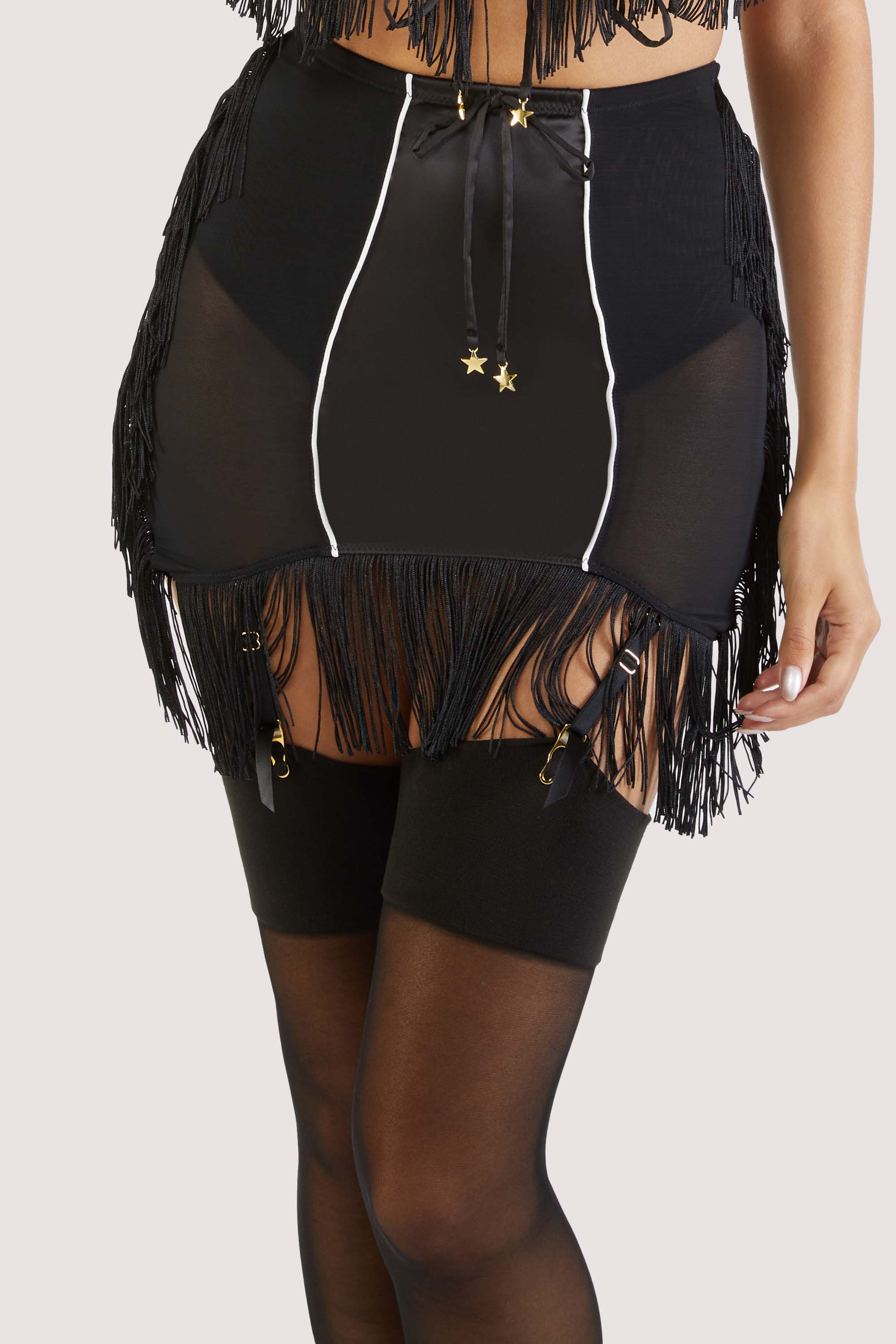 model wears Billie western cowboy fringe grindle with suspender