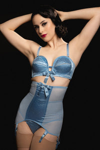 Core:model wears retro blue lingerie set with girdle