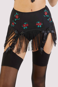 Black fringe-lined suspender belt with embroidered red flowers