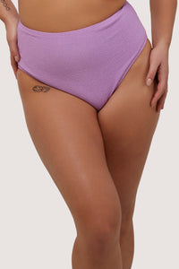 model wears high waist lilac scrunch fabric bikini bottoms