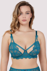 Model wears a teal eyelash lace balconette bra with underwired balconette cups and nude mesh with teal eyelash lace.
