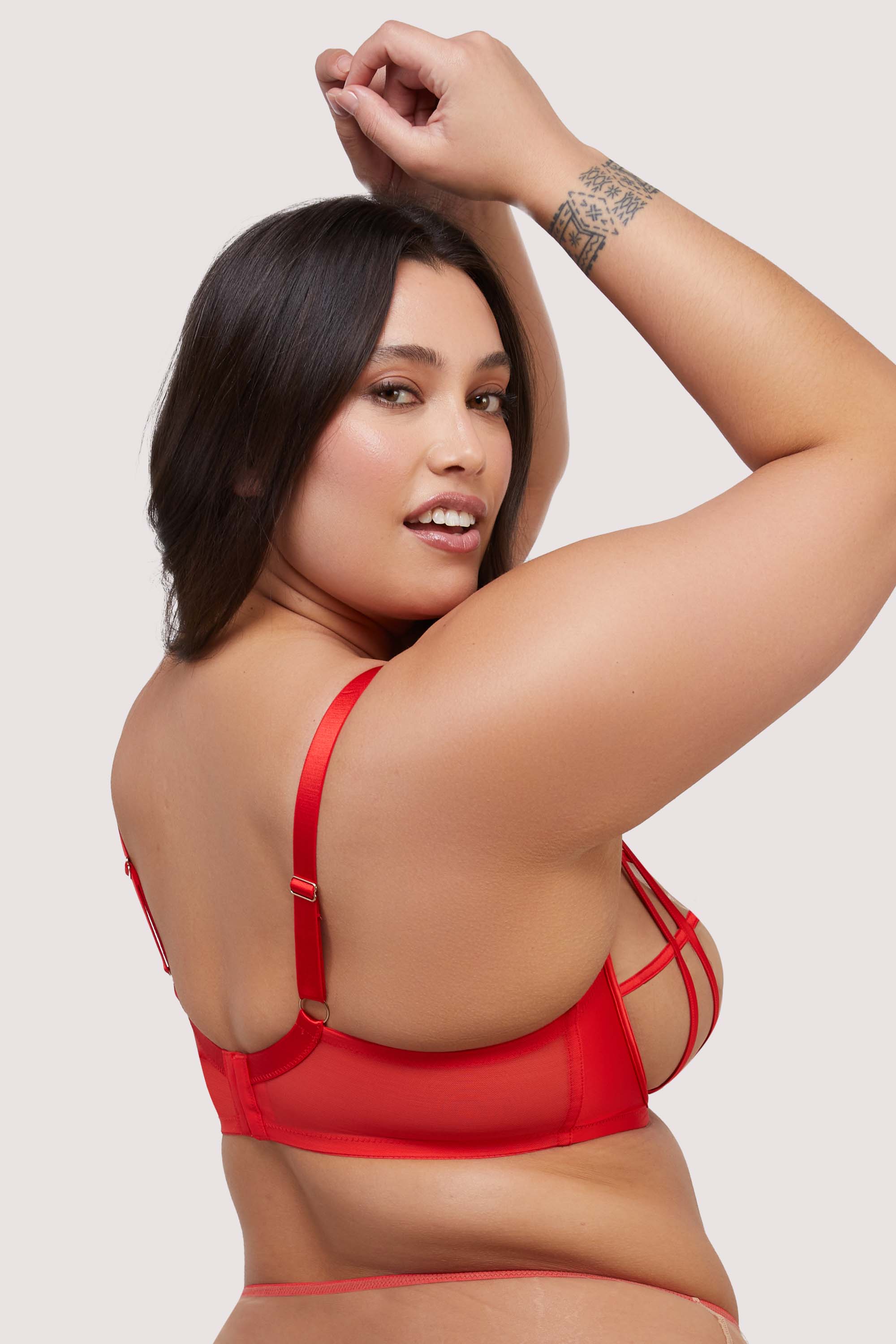 model shows red mesh hook and eye fastening bra back