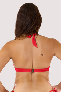 Model Wears Red halter neck bikini top featuring tie-up fastening at neck and gold clasp back closure.