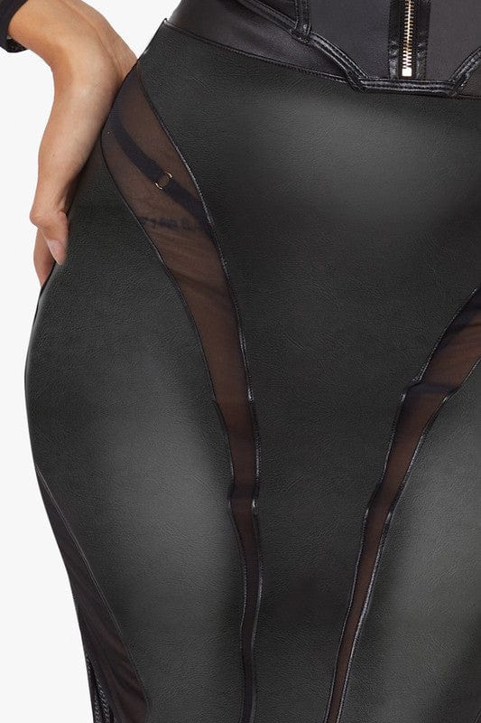 Model wears a black vegan leather mesh insert pencil skirt featuring leather panels with sheer mesh inserts with waist cinching, silhouette defining fit.