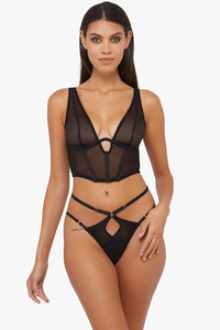 Model wears a Black mesh basque with a thong lingerie set