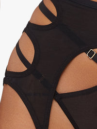 Black mesh suspender brief cut-out detail with adjustable strap and gold hardware